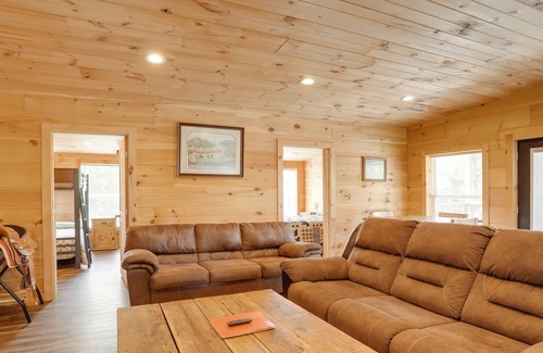 Bryant Cabin | Bryant Cabin Vacation Rental w/ Fire Pit!