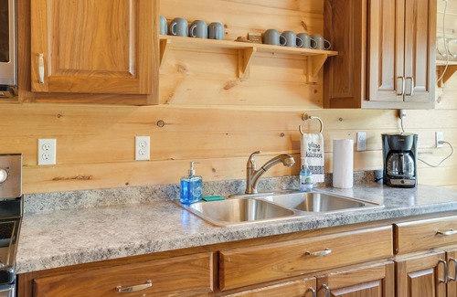 Bryant Cabin | Bryant Cabin Vacation Rental w/ Fire Pit!