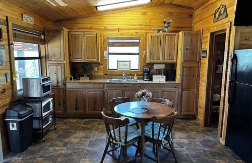 Murfreesboro Cabin | Buckeye cabin is nestled in the woods with access to the Little Missouri River.
