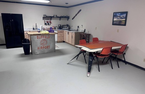 Amarillo House | Buffalo airport Fly Inn. 2 bedroom inside a airplane hangar!