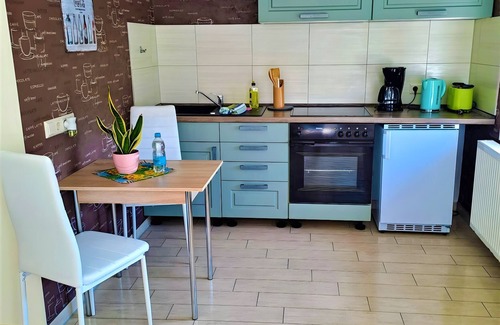 Neukalen House | Bungalow 'Ferienwohnung Naturblick' with Private Terrace, Private Garden and Wi-Fi