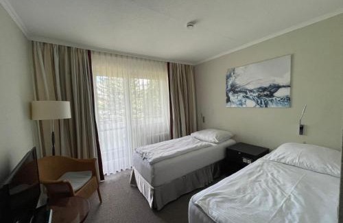 Schlangenluch Hotel | BusinessHotel Am Peetzsee Grünheide