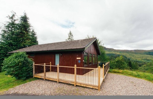 Crianlarich Ski Chalet | Buzzard - a beautiful 4 star holiday chalet surrounded by a true Highland landscape that can sleep