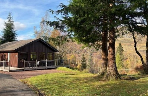 Crianlarich Ski Chalet | Buzzard - a beautiful 4 star holiday chalet surrounded by a true Highland landscape that can sleep