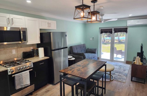 Rock Sound Apartment | By the Bay - Brand New Apartment, Steps to the Sea, Walk to Town