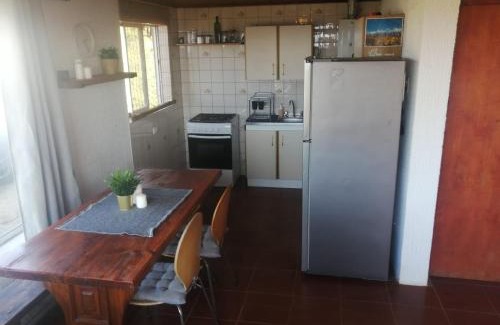 Pichilemu House | Cabaña a metros de la ola Punta de Lobos