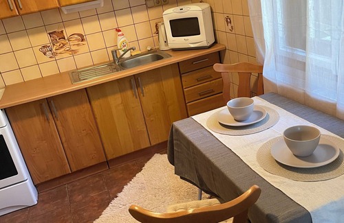 Tatranska Strba Cottage | Cabin in the heart of the Tatry Mountains, surrounded by forest.