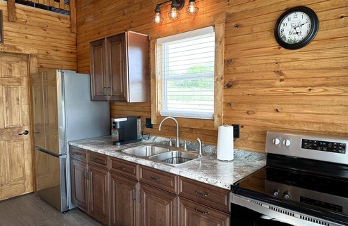Dry Ridge Cabin | Cabin on Dairy Farm - Near Ark - Feed Grain to Calves and Goats