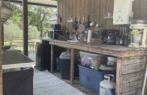 Brookridge RV Rental | Cabin Tent in an Olive Grove