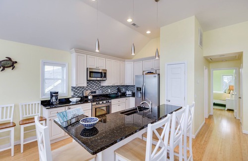 Captain's Cove House | Calypso is a breathtaking Waterfront Vacation Home in Captain`s Cove.