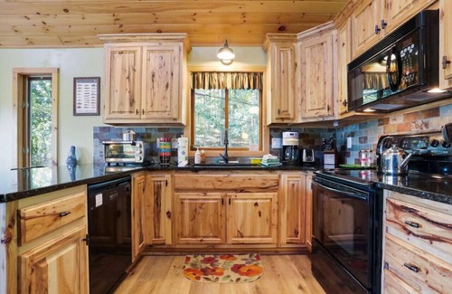 Great Cacapon Cabin | Camp Dancing Bears -riverfront, wifi, fire pit, fireplace, grill, king