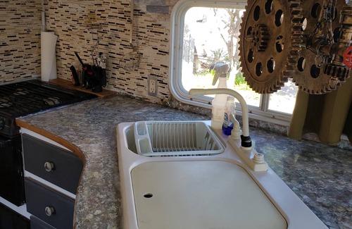 Eastside Promise Neighborhood RV Rental | Camper located inside Texas Renasaince Faire. Set up and ready to enjoy