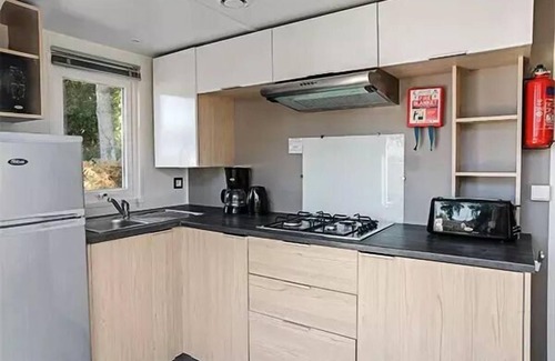La Boissiere-de-Montaigu House | Camping Heart of Vendée* - Mobile home Premium 3 rooms 4 people air-conditioned - TV
