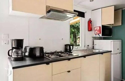 Joyeuse House | Camping La Nouzarède* - Mobile home Comfort 3 rooms 4 people