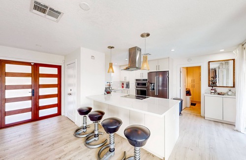 Coral Ridge Isles House | Canal-front home with private pool, dock, water views, amazing sunsets & fishing