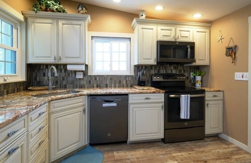 Bayshore Gardens House | CANAL FRONT W/DOCK, Water View, Dock your Boat, Free WIFI Dog - See Note.