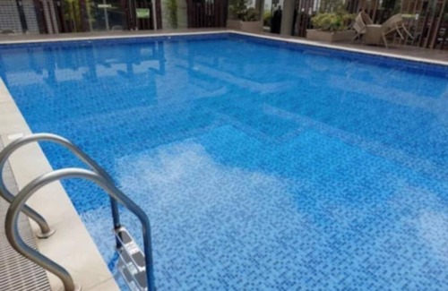 Cagayan de Oro Condo | Canary Yellowish Studio Condo Unit in Tranquil Cagayan De Oro City with WiFi, AC