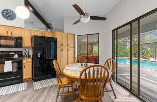 Spring Hill House | Candida's Retreat, 3-bedroom home with WiFi, AC, Heated Pool, on the 7th tee.