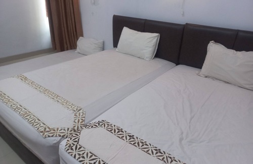 Purwokerto Hotel | Capital O 93872 Natura Guest House Syariah Near alun alun kota purwokerto