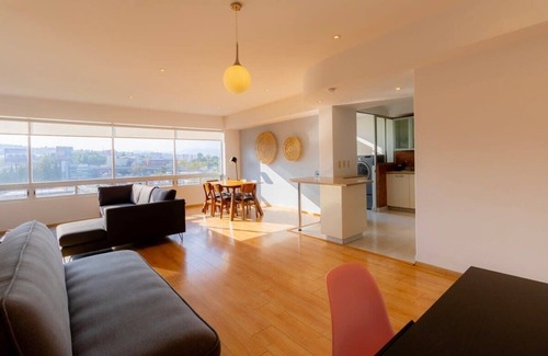 El Yaqui Condo | Capitalia - Chic Renovated w/Garden