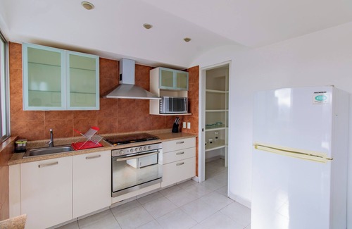 El Yaqui Condo | Capitalia - Family Apt at Santa Fe