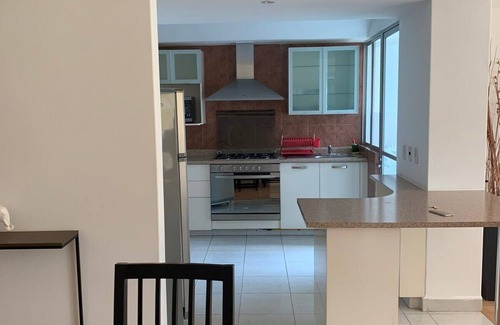 El Yaqui Condo | Capitalia - Fast Wi-Fi & Clean
