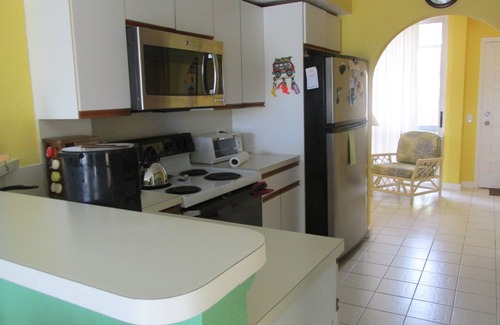 Estate Salt River Condo | Caribbean colors on wide open estate on a long sandy swimming beach.