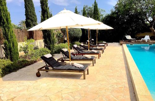 Es Llombards House | CASA 3 LEONES - Stadthaus im Fincastil mit Longpool, Patio, Garten