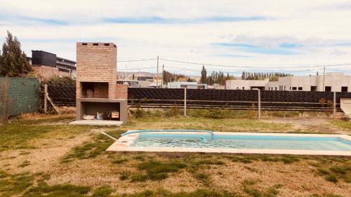 General Roca House | Casa con pileta y parrilla en barrio privado, 2 dormitorios