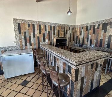 Capitolio House | Casa em Escarpas do Lago