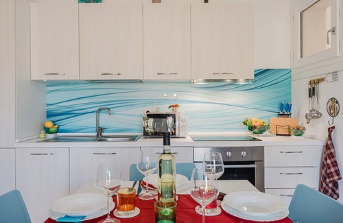 Viddalba Apartment | Casa Lidia, with Shared Pool, Private Parking and Garden; Bouganville Residence in Viddalba