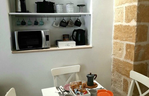 Brindisi Histotic Center Apartment | "Casa Mimà": characteristic architecture of the historic center with a modern style.