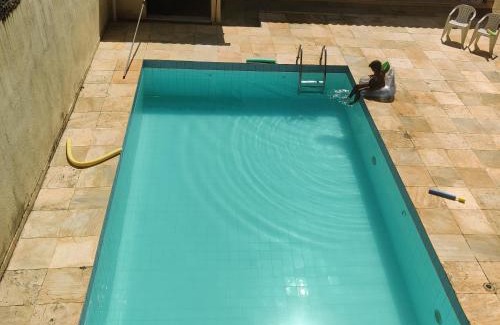 Coqueiral House | Casa muito espaçosa privativa com Piscina, Churrasqueira e área gourmet