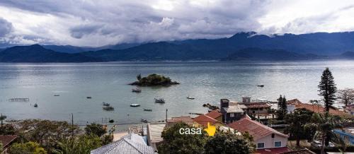 Florianopolis House | Casa pé na areia com vista especial do pôr do sol.