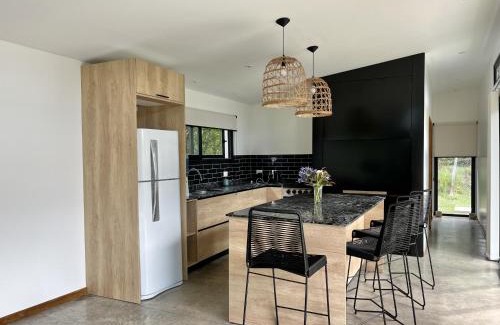 Los Acantilados Apartment | Casa Paola - Loft en Zona Acantilados Para 4 PAX Con Pileta - Hola Sur