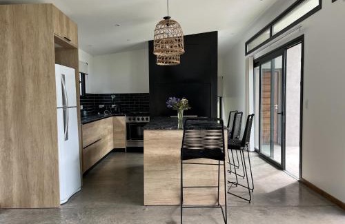 Los Acantilados Apartment | Casa Paola - Loft en Zona Acantilados Para 4 PAX Con Pileta - Hola Sur