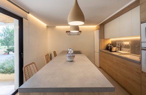 Santa Eulalia del Rio Villa | Casa Rosita, free Wifi, 75 meters from the Niu Blau beach, ideal families.
