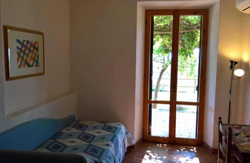 Capalbio Apartment | Casa Terra - private garden, parking, privacy and view