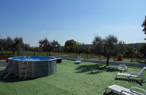 Casalini House | Casa Viola F: A welcoming apartment surrounded by the greenery, with Free WI-FI.