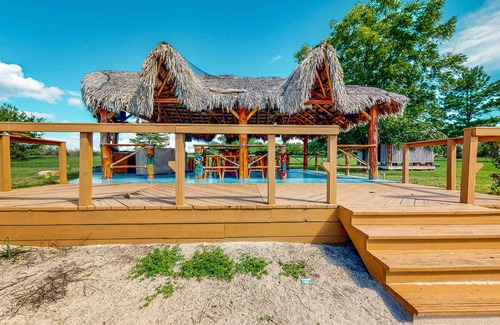 Waller Cabin | Cedar Cabin with Pretty Pond, Beach, Swimming Deck & Tropical Hut/Bar