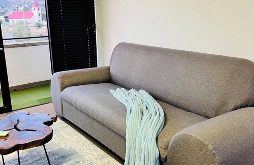 Windhoek Apartment | Central Delight with a Serene Balcony