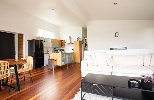 Raglan House | Central Raglan Stylish Retreat with Sea Views