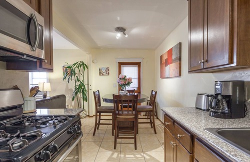 Mid City Cottage | Centrally located! 15 min. to beach, outdoor patio & pet friendly!