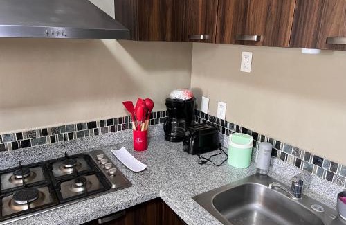 San Juan de Dios Apartment | Centrally located apartment with AC, parking and pool