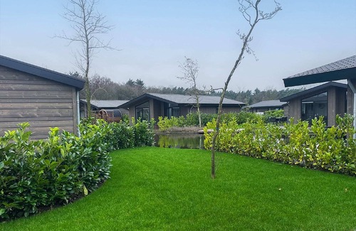 Municipality of Veldhoven Ski Chalet | Chalet by Park Pond in the Netherlands