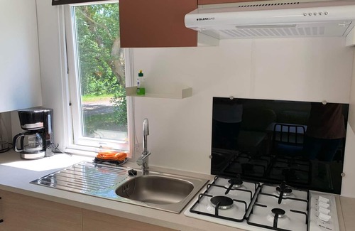 Mittelhof Apartment | Chalet Eichhörnchen - Camping im Eichenwald