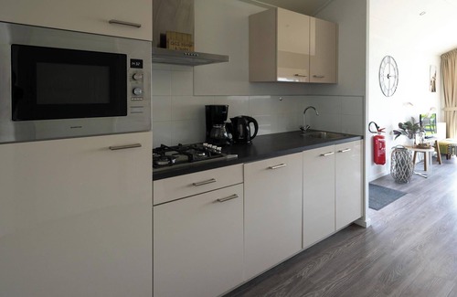 Municipality of Stede Broec House | Chalet situated at the waterfront with terrace