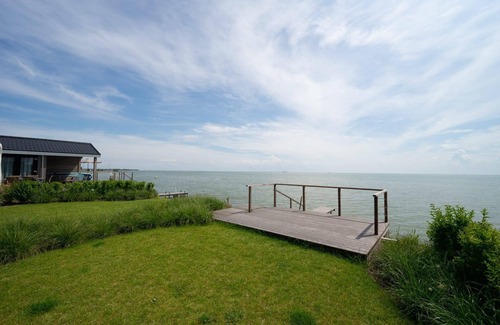 Municipality of Stede Broec House | Chalet situated at the waterfront with terrace