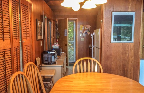 Meredith Cottage | Chalet-style lakefront home with private dock, beach, kayak, canoe & epic view