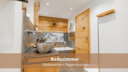 Heiligenblut Apartment | Chalet WaldHäusl luxuriöse Ferienwohnungen mit Sauna & Whirlpool, Kamin, Balkon oder Terrasse mit Bergblick